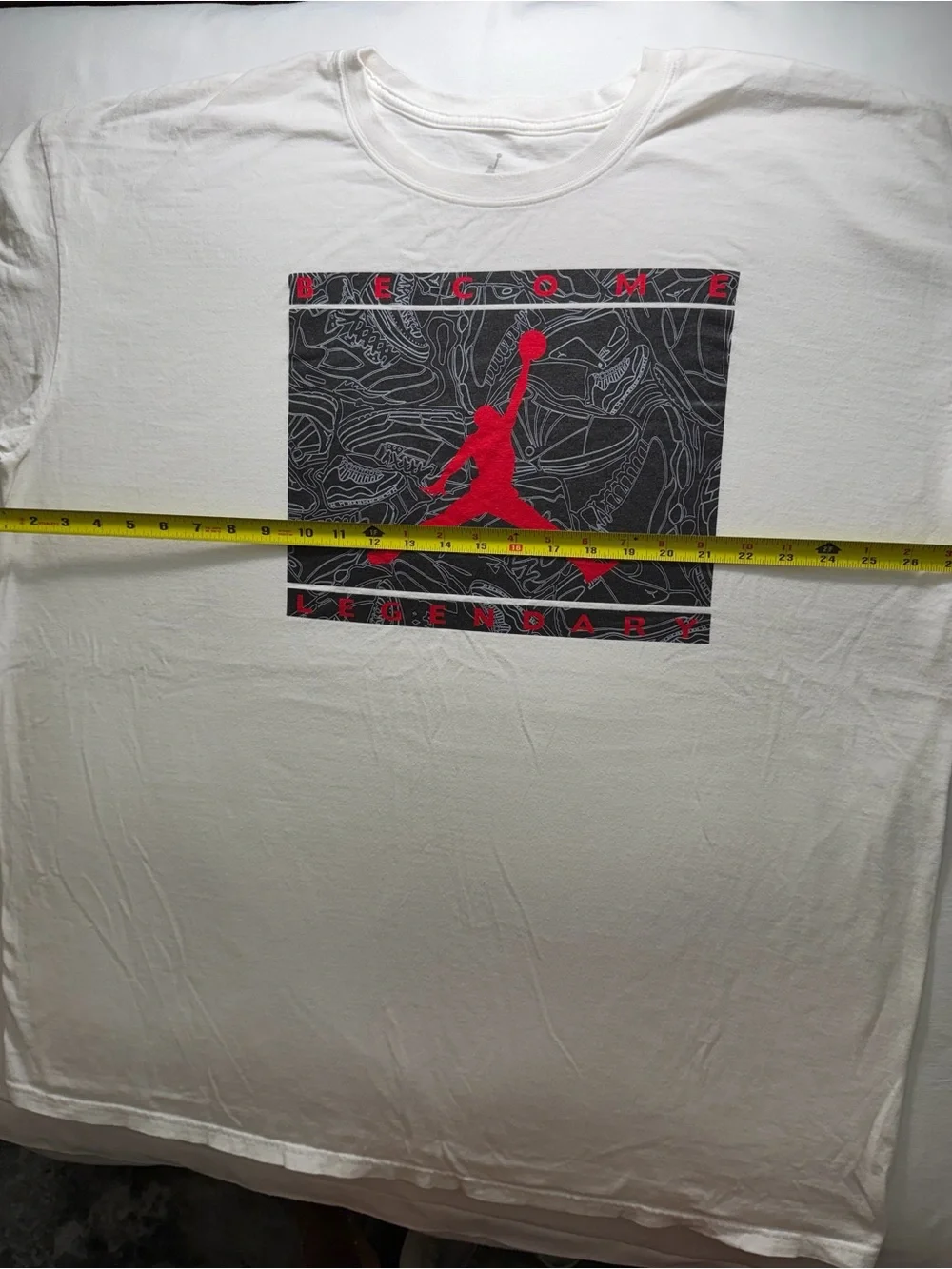 Jordan Men’s White T-Shirt with Red and Black Jumpman Graphic